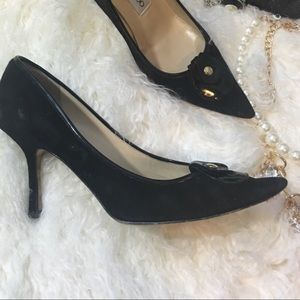 Classical Jimmy Choo black pumps